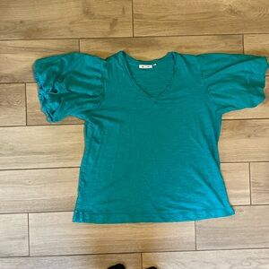 Teal Shirt with Puffy short sleeves.